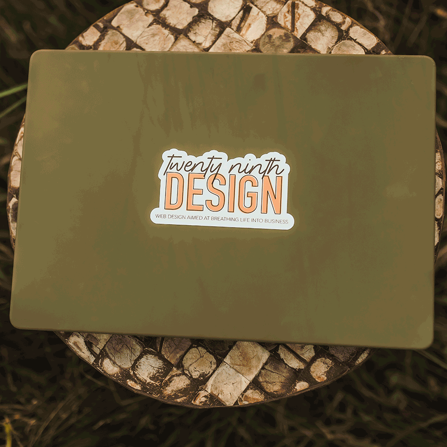 Gif changing between a photo of 29th design's green laptop and a close up of the Nebraska prairie in the golden summer evening light.